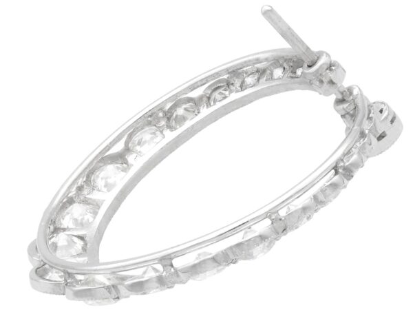 underside of platinum diamond hoop earrings