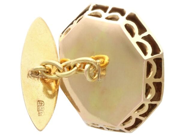 gold cufflink with carnelian gemstone