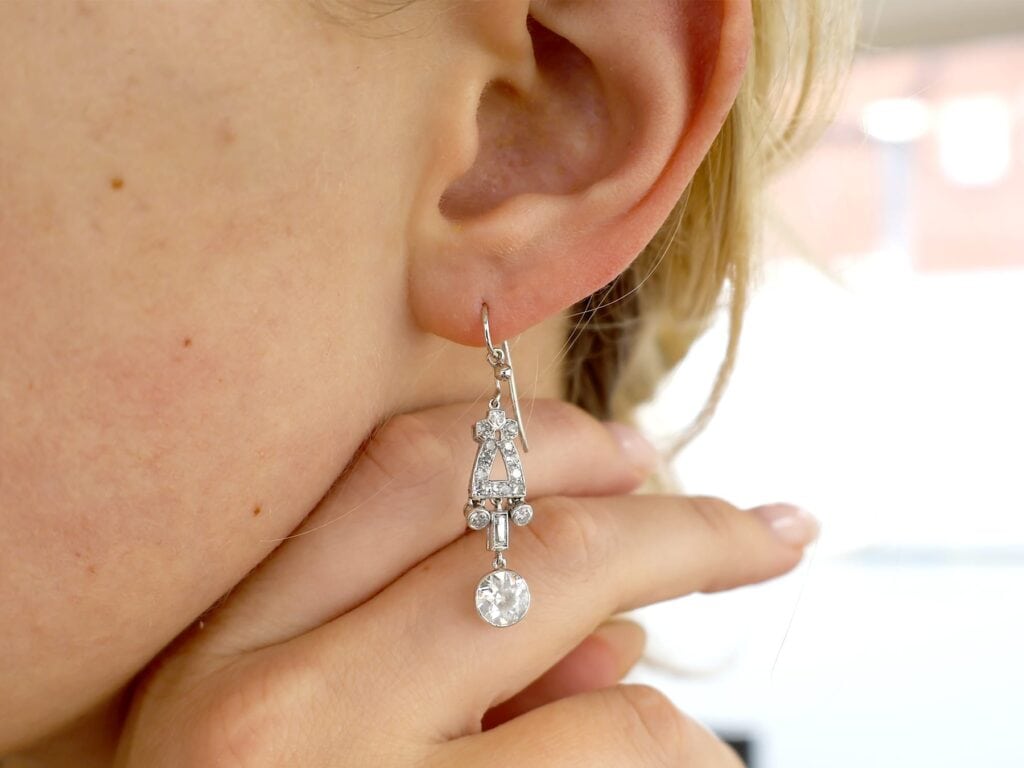 wearing 1920s diamond drop earrings