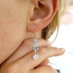 wearing 1920s diamond drop earrings