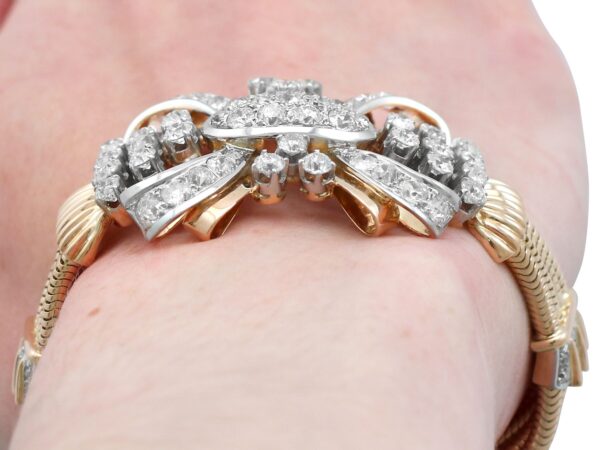 gold art deco bracelet on arm