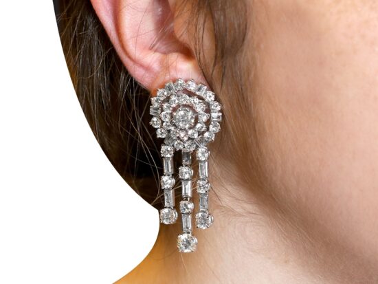 Vintage Diamond Earrings Being Worn