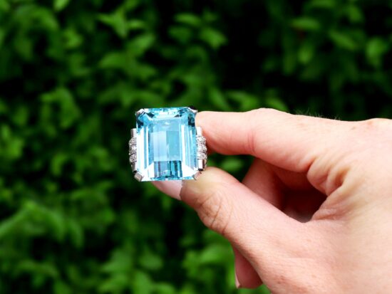 Large Aquamarine Cocktail Ring with diamonds outside