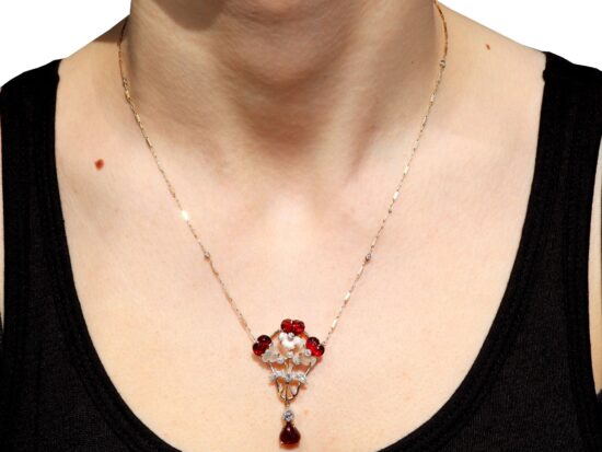 wearing Garnet Pendant in Gold with Moonstone
