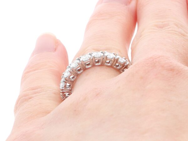 Full Diamond Eternity Ring White Gold on hand