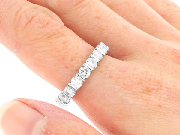 18k white gold diamond eternity ring on finger