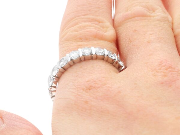 18k white gold diamond eternity ring on finger