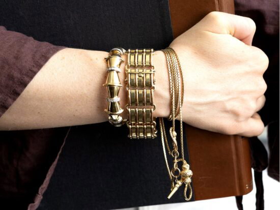 wearing gold bracelets