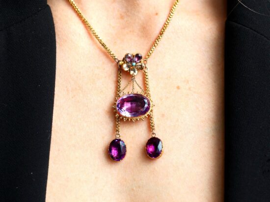wearing amethyst necklace