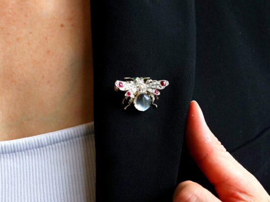 wearing moonstone brooch