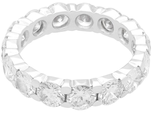 side view of diamond and white gold eternity ring for women