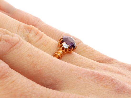 Purple Sapphire Ring Being Worn