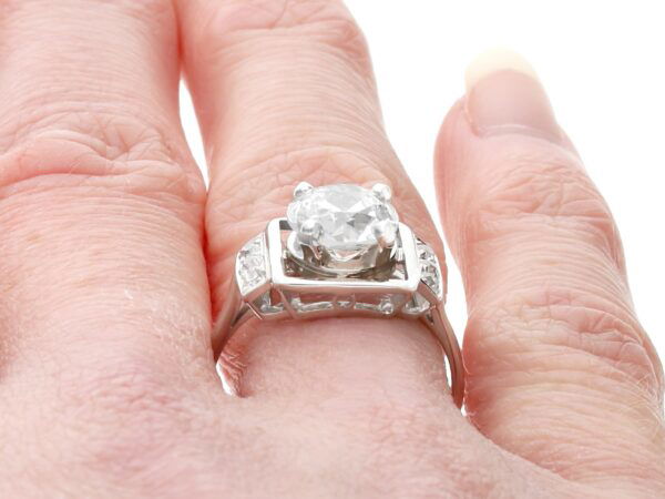 wearing antique GIA diamond ring