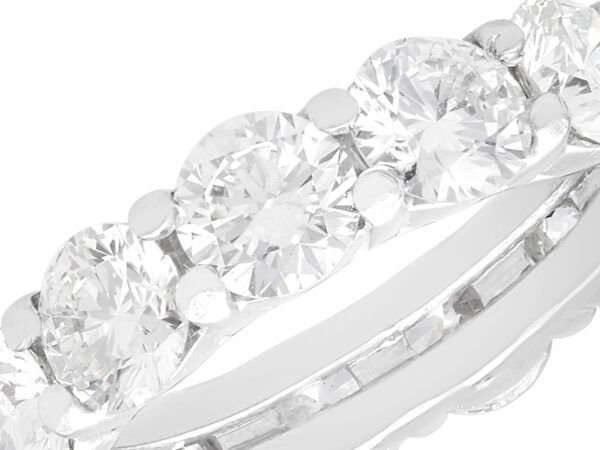 close up diamonds on white gold eternity band