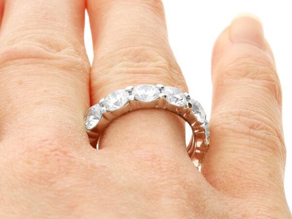 white gold full eternity ring on hand