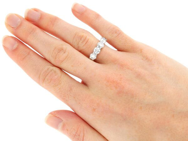 white gold diamond full eternity ring on hand