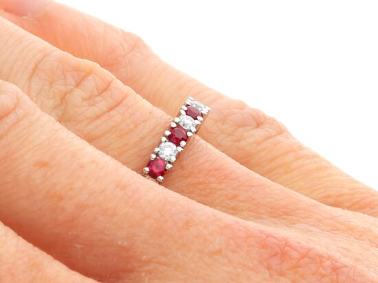 18ct White Gold Ruby and Diamond Eternity Ring on hand