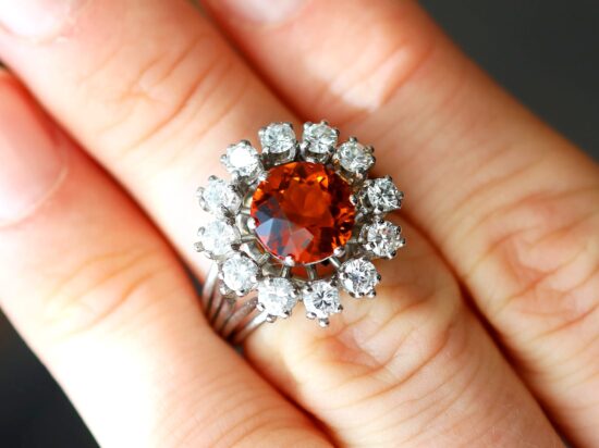 citrine and diamond dress ring on finger