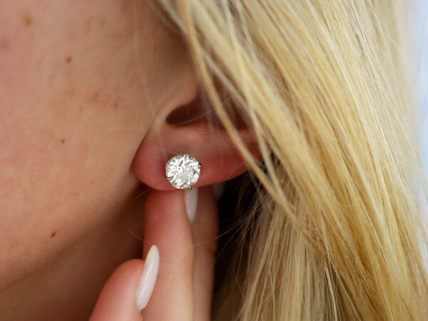 wearing platinum 3.48ct Diamond Stud Earrings