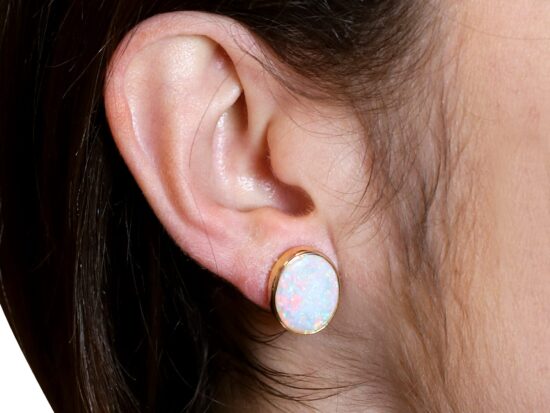 Vintage Opal Earrings Being Worn