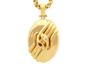 antique gold snake locket