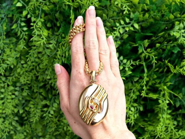 antique gold snake locket outside