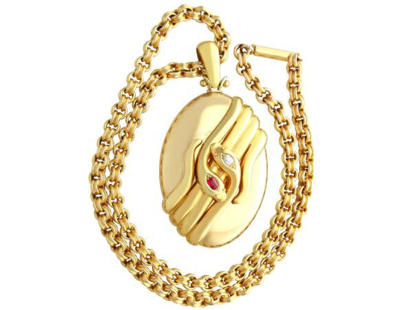 antique gold snake locket