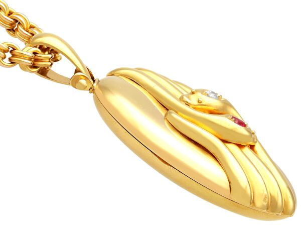 antique gold snake locket