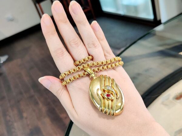 antique gold snake locket