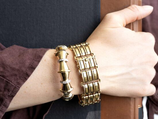 gold bracelets on wrist