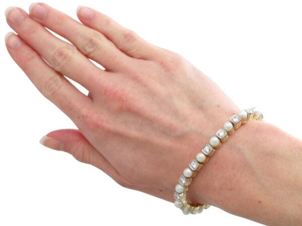 wearing antique pearl and diamond line bracelet