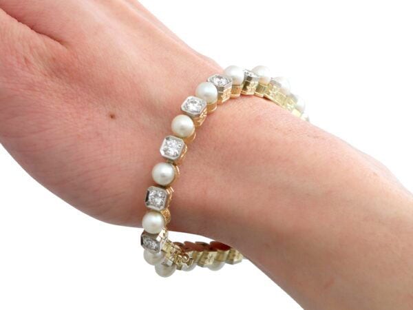 antique pearl and diamond line bracelet on wrist