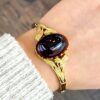 Garnet Gold Bangle On Wrist