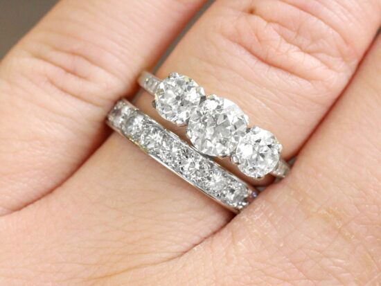 diamond trilogy and eternity stacked on finger