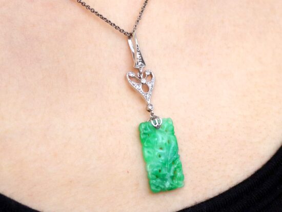 Jade Pendant Being Worn Closeup