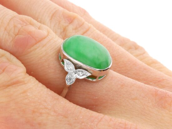 Jadeite Ring On Finger Closeup
