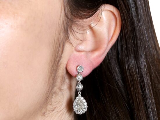Diamond Earrings Being Worn Closeup