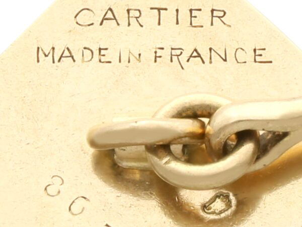 cartier signature on cufflinks