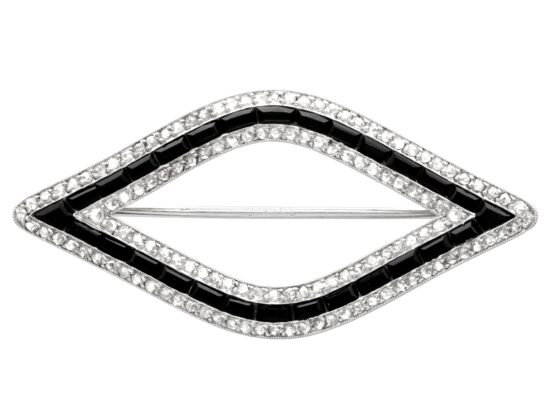 Cartier Black Onyx and Diamond Brooch