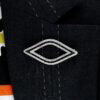 wearing Cartier Black Onyx and Diamond Brooch