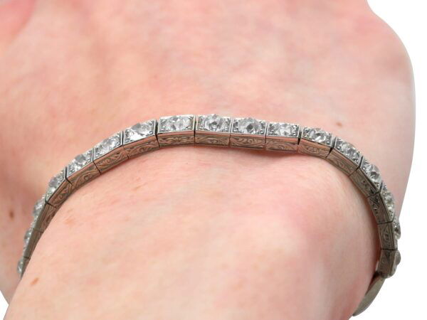 old cut antique diamond bracelet in white gold on wrist