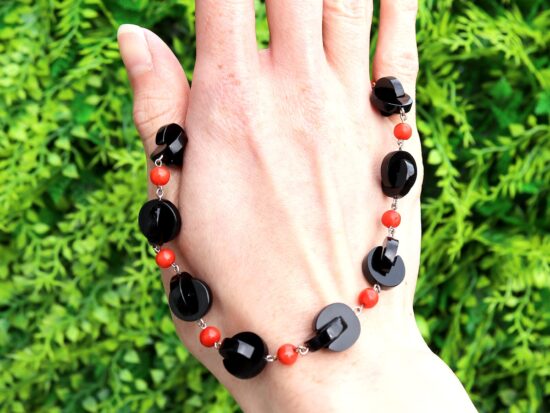 Vintage Onyx and Coral Necklace outside