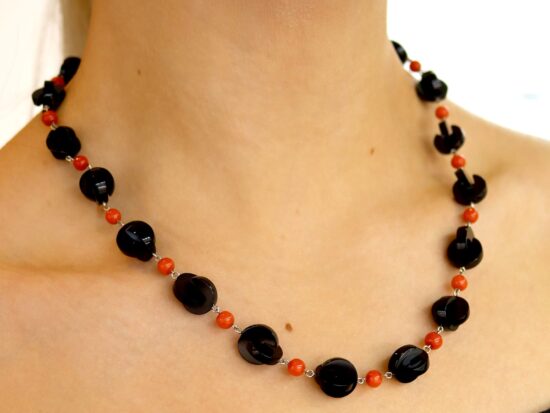 Vintage Onyx and Coral Necklace being worn