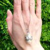 Pearl Diamond and Ruby Snake Pendant outside