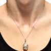 Pearl Diamond and Ruby Snake Pendant on neck