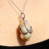wearing Pearl Diamond and Ruby Snake Pendant