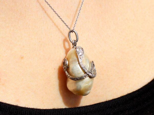 wearing Pearl Diamond and Ruby Snake Pendant
