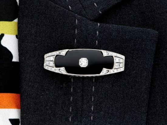 Art Deco Onyx Brooch with Diamonds wearing