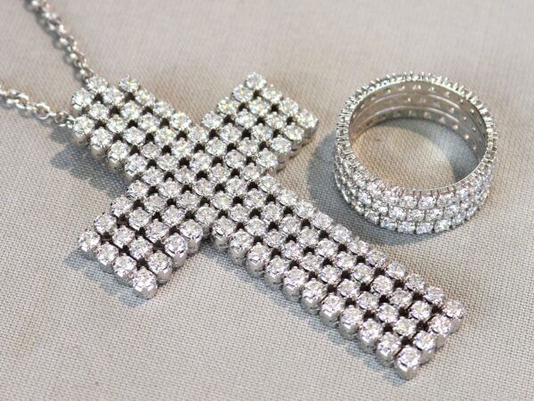 three row diamond eternity ring with diamond pendant