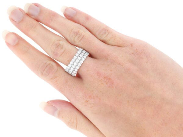 three row diamond eternity ring on hand